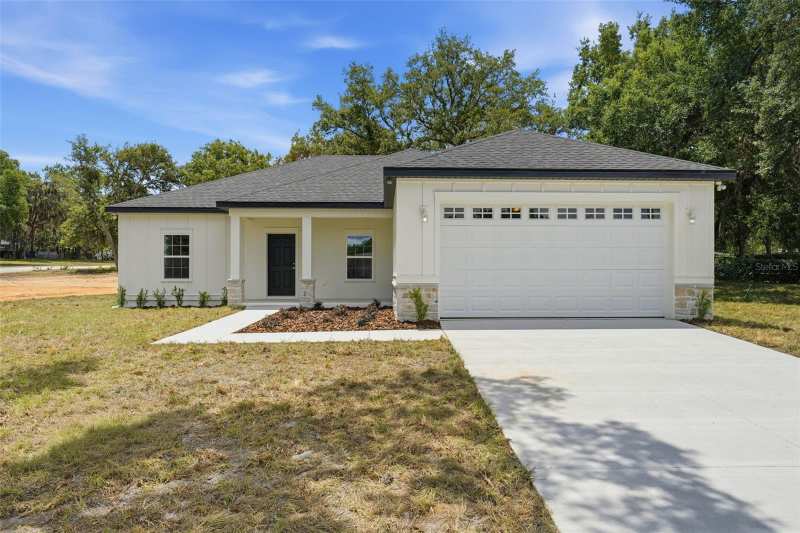 4 bedroom Single Family Residence at 13404 New York Avenue, Astatula Monroe Park, Astatula — photo 1