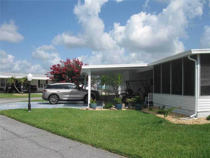 2 bedroom Manufactured Home at 326 Victoria Drive, Sweetwater Golf & Tennis Club, Haines City — photo 2