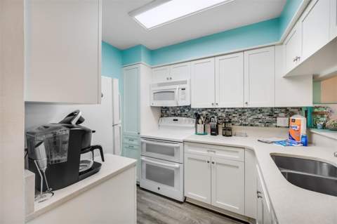 260 Medallion Boulevard #F, Madeira Beach FL - photo 9 of 30