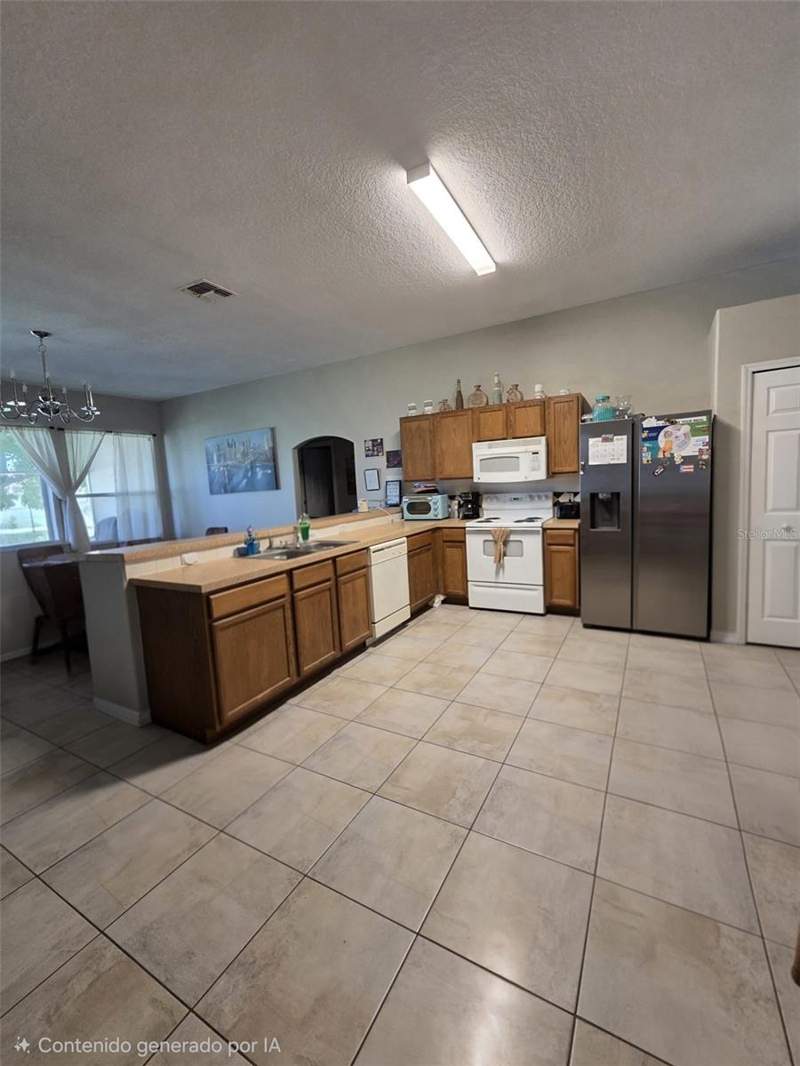 4 bedroom Single Family Residence at 407 MARTIGUES DRIVE, POINCIANA VILLAGE 5 NBHD 1, KISSIMMEE — photo 2
