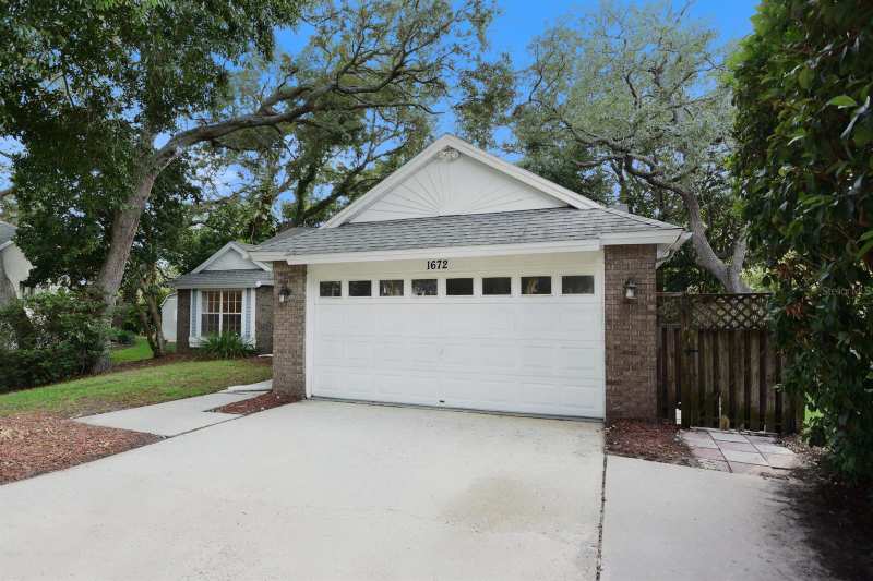 3 bedroom Single Family Residence at 1672 Countrywood Street, Rolling Oaks, Tarpon Springs — photo 1
