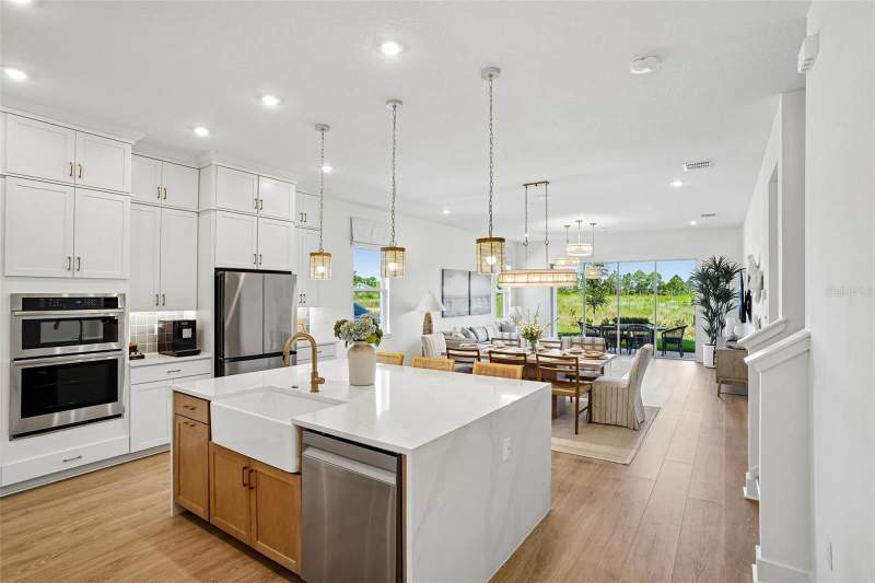 5 bedroom Single Family Residence at 17428 Honeybell Tangelo Court, Northlake At Ovation, Winter Garden — photo 5