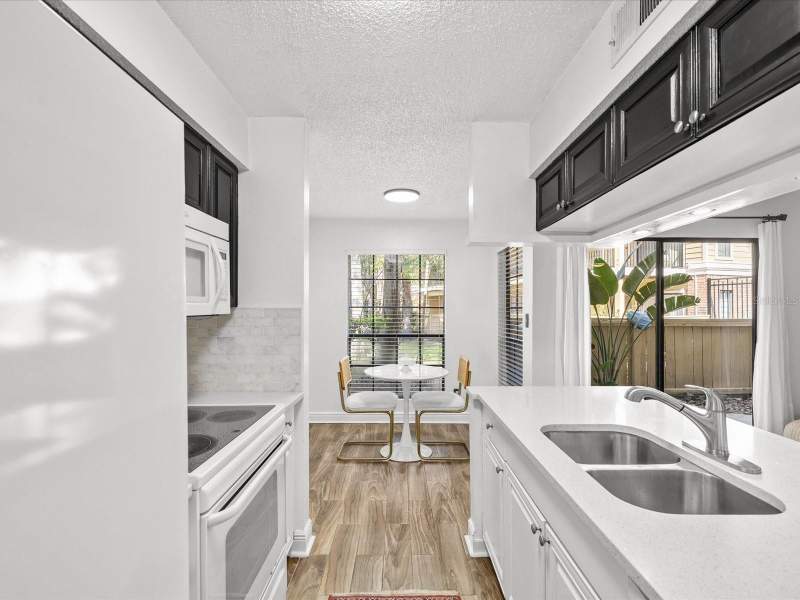 1 bedroom Condominium at 8653 MALLARD RESERVE DRIVE #103, THE GRAND RESERVE CONDO, TAMPA — photo 4
