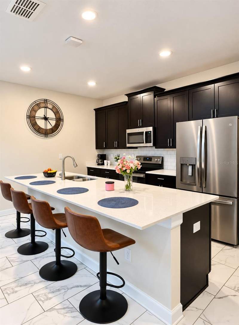 4 bedroom Townhouse at 8953 Stinger Drive, Stoneybrook South Ph J-2 & J-3, Davenport — photo 5