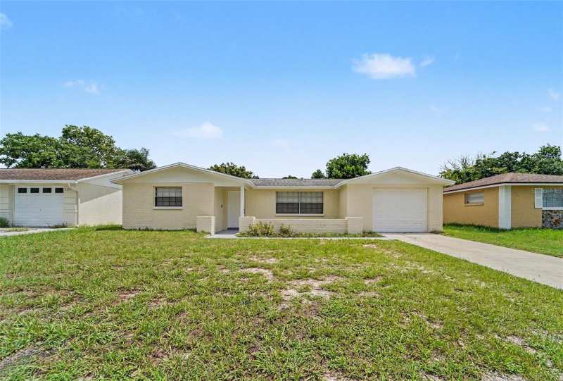 4 bedroom Single Family Residence at 5102 School Road, Tanglewood Terrace, New Port Richey — photo 1