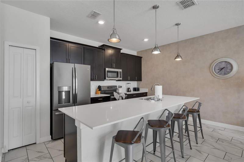 4 bedroom Townhouse at 9005 Stinger Drive, Stoneybrook South Ph J-2 & J-3, Davenport — photo 4