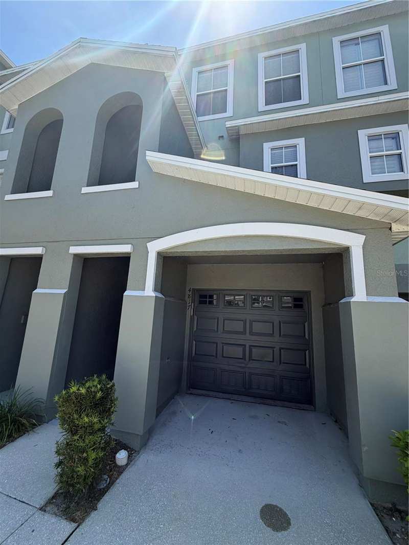 2 bedroom Townhouse at 4817 Tuscan Loon Drive, Palm River Twnhms Ph 1, Tampa — photo 1