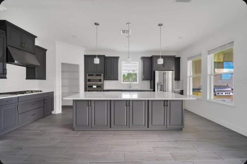 4 bedroom Single Family Residence at 15997 HONEY HARVEST STREET, HARVEST AT OVATION, WINTER GARDEN — photo 3