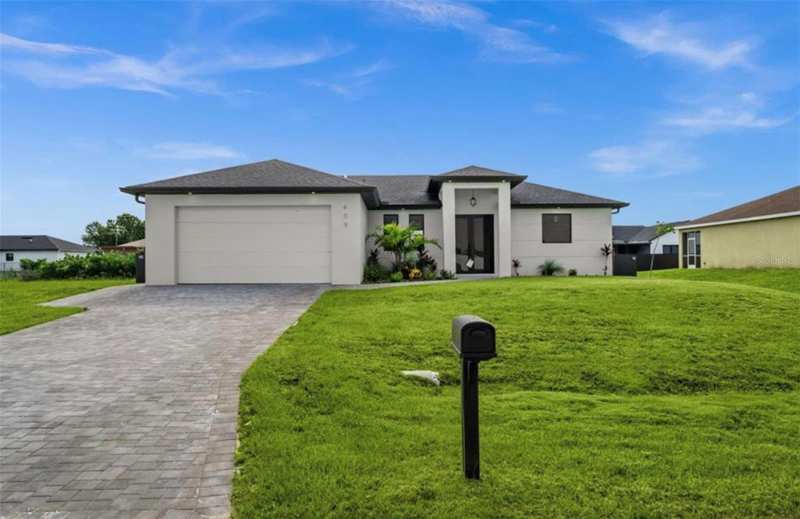3 bedroom Single Family Residence at 409 NW 25th Place, Cape Coral, Cape Coral — photo 1