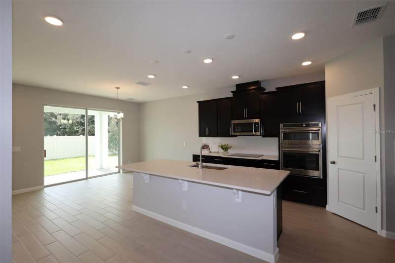 5 bedroom Single Family Residence at 2685 Great Heron Avenue, Bay Lake Farms At St Cloud, St Cloud — photo 3
