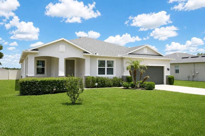 4 bedroom Single Family Residence at 10026 WEATHERS LOOP, HIGHLAND GROVES PH II SUB, CLERMONT — photo 1