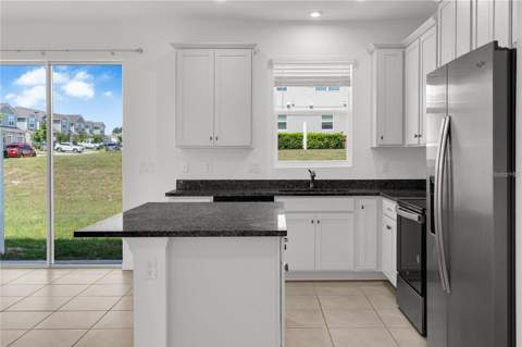 1104 Lakeshore Breeze Place, Kissimmee FL - photo 7 of 35