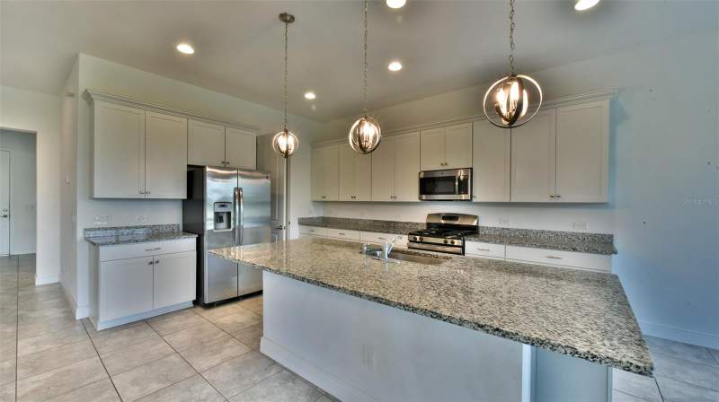 4 bedroom Single Family Residence at 9152 Olmo Court, Magnolia At Westside Ph 2, Davenport — photo 3