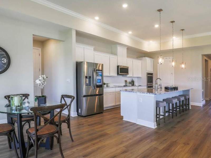 4 bedroom Single Family Residence at 930 BUCKEYE DRIVE, RESERVE AT HAMMOCK OAKS, LADY LAKE — photo 4