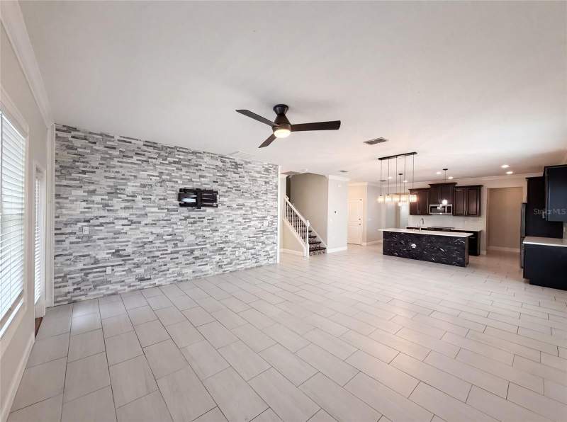 6 bedroom Single Family Residence at 1423 Pro Shop Court, Stoneybrook South Ph F-1, Davenport — photo 3