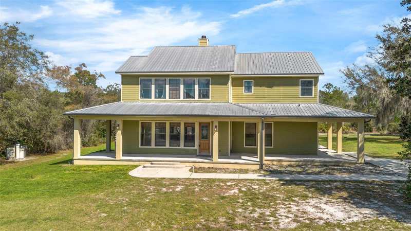 4 bedroom Single Family Residence at 326 Enterprise Osteen Road, Cambridge Villas, Osteen — photo 1