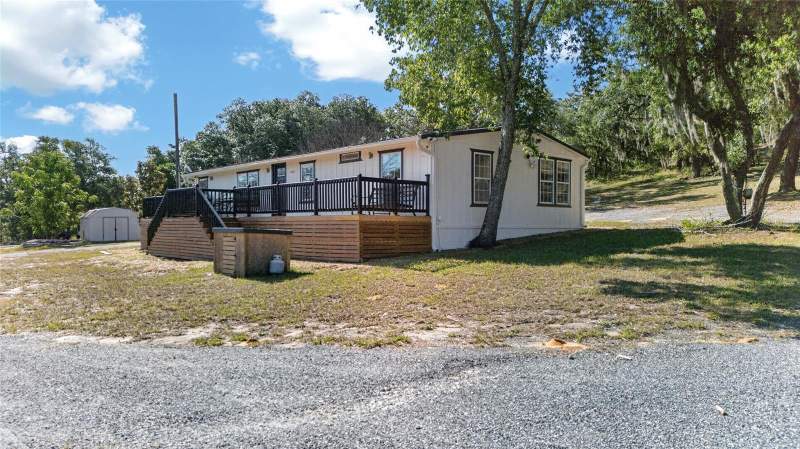 3 bedroom Manufactured Home at 14318 ROCK N ROLL ROAD, ACREAGE & UNREC, CLERMONT — photo 3