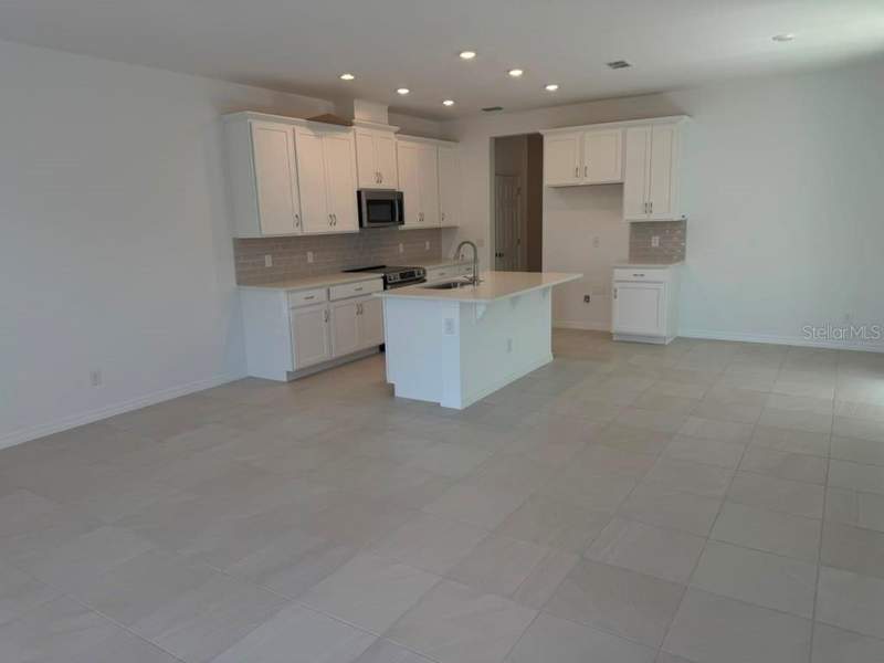 4 bedroom Single Family Residence at 408 Oak Flat Alley, Cypress Bluff Ph 1, Groveland — photo 4