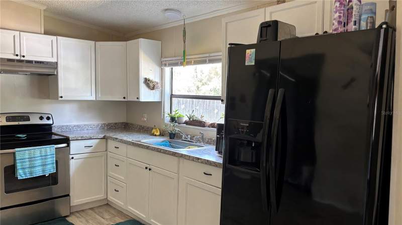 3 bedroom Manufactured Home at 14902 NE 142nd Street, Brannings 2nd Add To Waldo, Waldo — photo 5