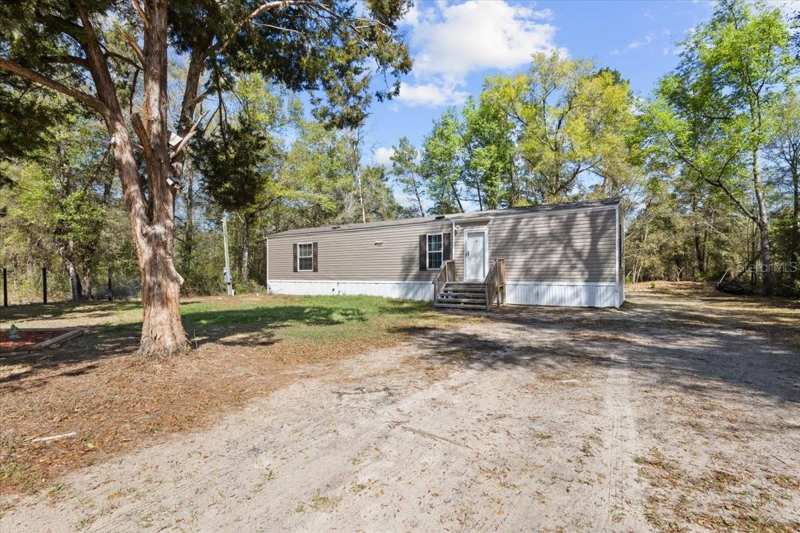 2 bedroom Manufactured Home at 11061 NE 65th Lane, Oak Ridge Estates, Williston — photo 1