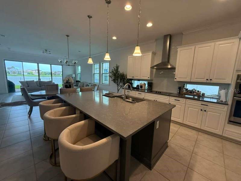 5 bedroom Single Family Residence at 13713 Larkton Lane, Eagle Crk Village J & K Ph 2B1, Orlando — photo 3
