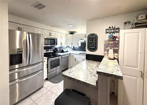 1555 Beacon Drive, Port Charlotte FL - photo 7 of 31