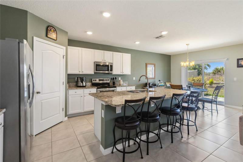 5 bedroom Single Family Residence at 2464 White Poppy Drive, Murano At Westside, Kissimmee — photo 4