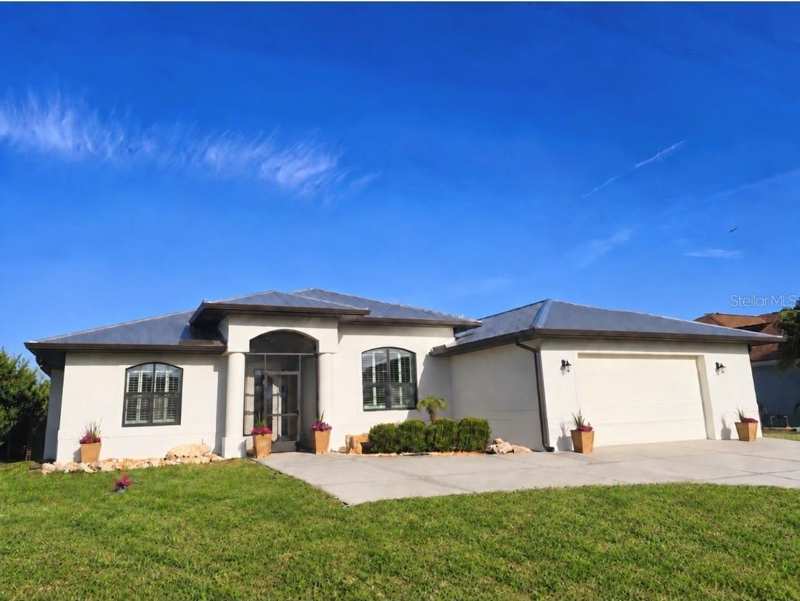 4 bedroom Single Family Residence at 9150 Melody Circle, Port Charlotte Sec 071, Port Charlotte — photo 1