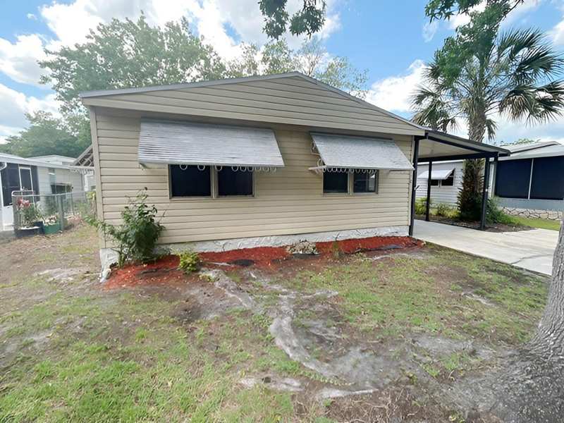 3 bedroom Manufactured Home at 170 Palm Drive, Leisure World Park, Debary — photo 1