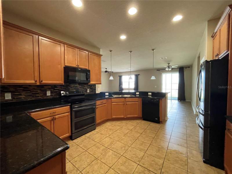 4 bedroom Single Family Residence at 10026 WEATHERS LOOP, HIGHLAND GROVES PH II SUB, CLERMONT — photo 2