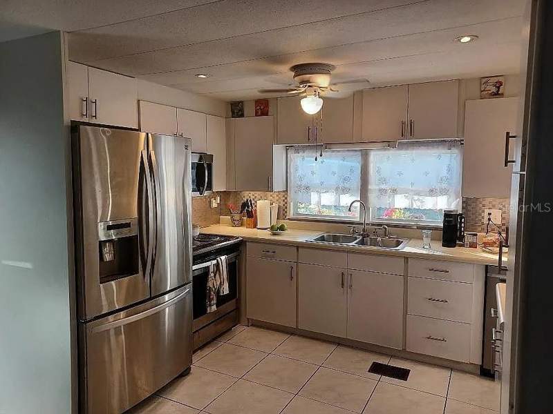 2 bedroom Mobile Home at 7880 54TH AVENUE #106, CLUB CHALET UNREC MHP, ST PETERSBURG — photo 3