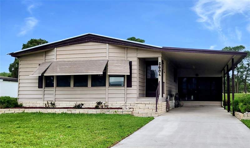 2 bedroom Manufactured Home at 2604 MCDANIEL DRIVE, BROADMOOR, KISSIMMEE — photo 1