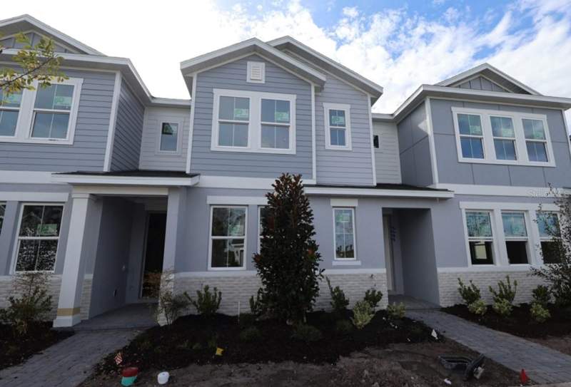 3 bedroom Townhouse at 5620 Coopers Hawk Trail, Palmeras At Crossprairie, St Cloud — photo 2