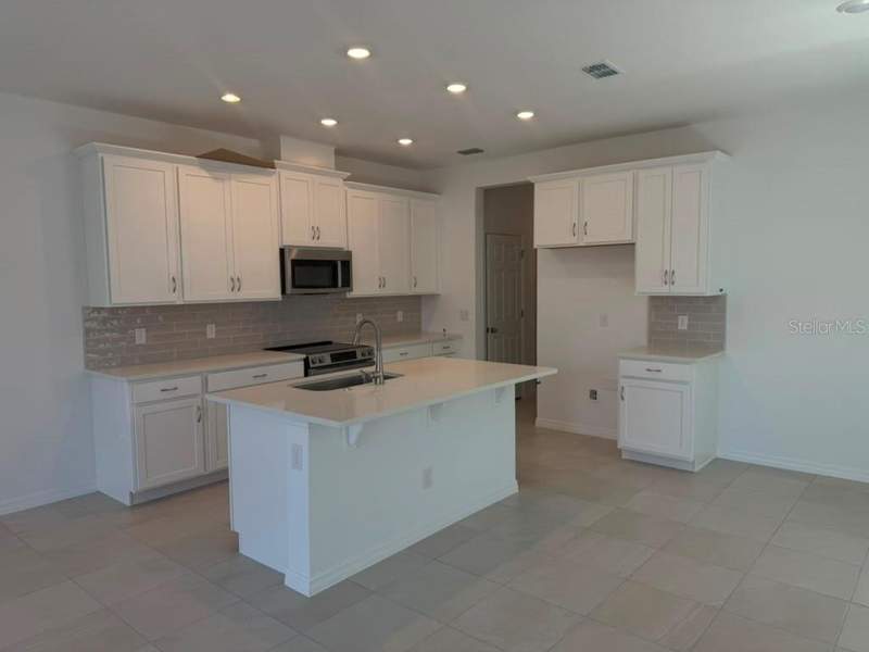 4 bedroom Single Family Residence at 408 Oak Flat Alley, Cypress Bluff Ph 1, Groveland — photo 3