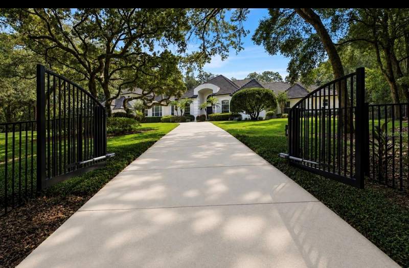 5 bedroom Single Family Residence at 950 Sweetwater Club Boulevard, Sweetwater Club Unit 6, Longwood — photo 2