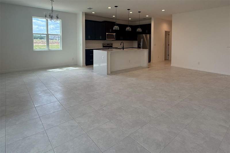 4 bedroom Single Family Residence at 7171 ROLLING LEAF ROAD, TRINITY LAKES PHASE 4, GROVELAND — photo 2