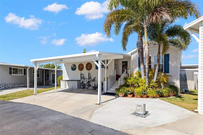 3 bedroom Manufactured Home at 7166 Mount Arlington Drive #418, Mobel Americana Mobile Home Park Unrec, St Petersburg — photo 2