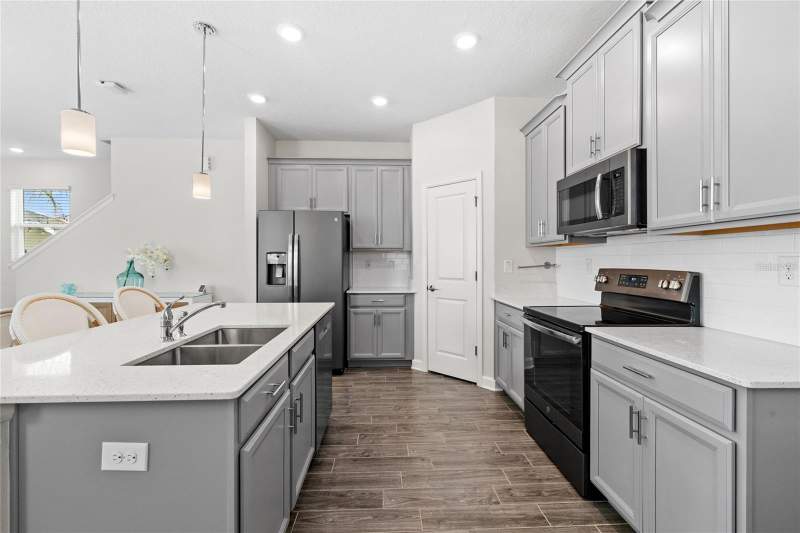 4 bedroom Single Family Residence at 17167 WRITING ALLEY, STOREY GROVE PH 1B, WINTER GARDEN — photo 2