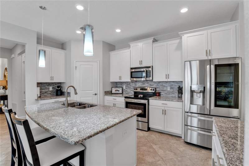 4 bedroom Single Family Residence at 1419 Pro Shop Ct, Stoneybrook South Ph F-1, Davenport — photo 3