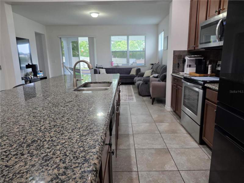 4 bedroom Single Family Residence at 12749 Garridan Avenue, Wickham Park, Windermere — photo 4
