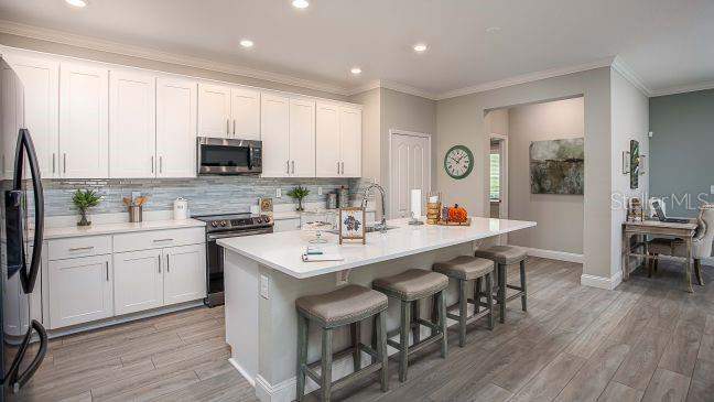 4 bedroom Single Family Residence at 6462 CHORUS DRIVE, VILLA PASS PH 2, MASCOTTE — photo 5