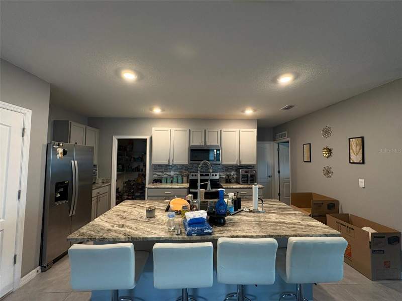5 bedroom Single Family Residence at 928 August Sky Drive, Courtland Park Ph 2, Deltona — photo 2