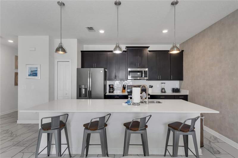 4 bedroom Townhouse at 9005 Stinger Drive, Stoneybrook South Ph J-2 & J-3, Davenport — photo 3
