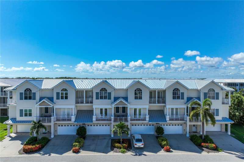 4 bedroom Townhouse at 10300 Coral Landings Court #91, Landings/Coral Crk, Placida — photo 1
