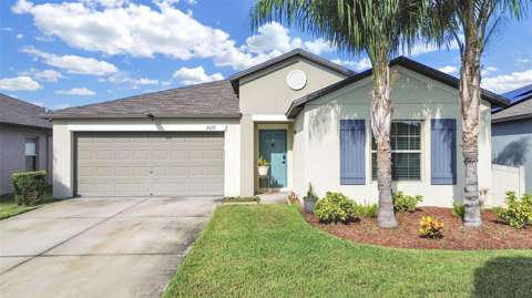 5037 White Chicory Drive, $300k–$500k for sale in Apollo Beach