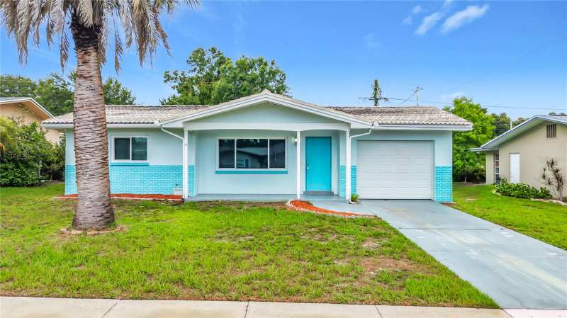 3 bedroom Single Family Residence at 890 7th Avenue, Largo Lake Villas, Largo — photo 1