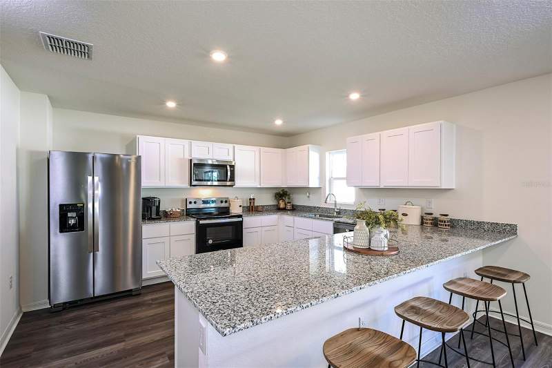 3 bedroom Single Family Residence at 704 Oak Hammock Way, Grand Oaks On Lake Damon, Avon Park — photo 5