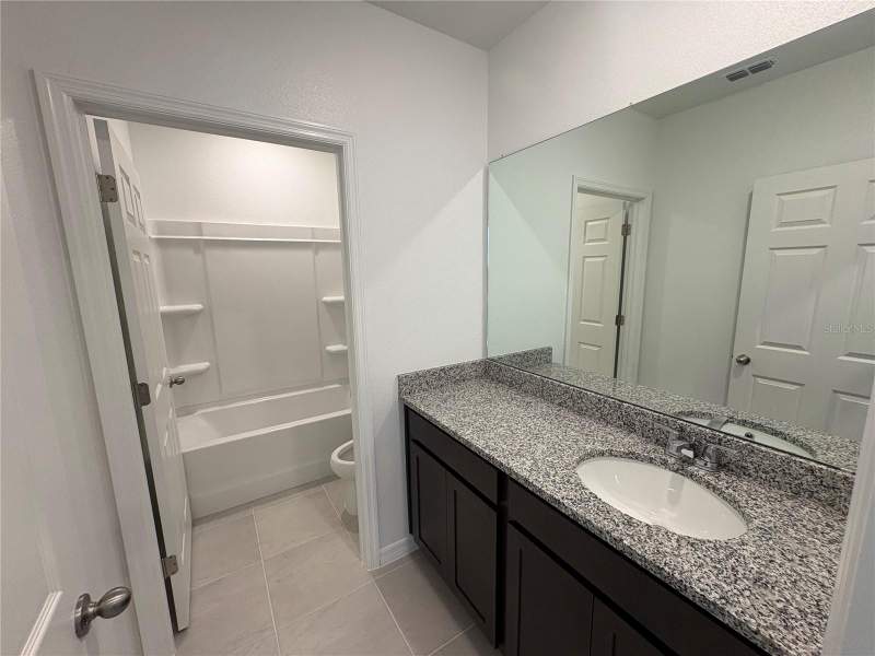 4 bedroom Single Family Residence at 27464 Black Kite Avenue, Eagletail Landing - Ph 1, Howey In The Hills — photo 3