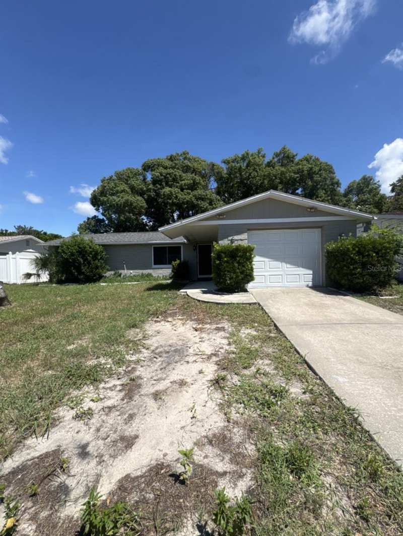 2 bedroom Single Family Residence at 8930 Windsong Lane, Embassy Hills, Port Richey — photo 1
