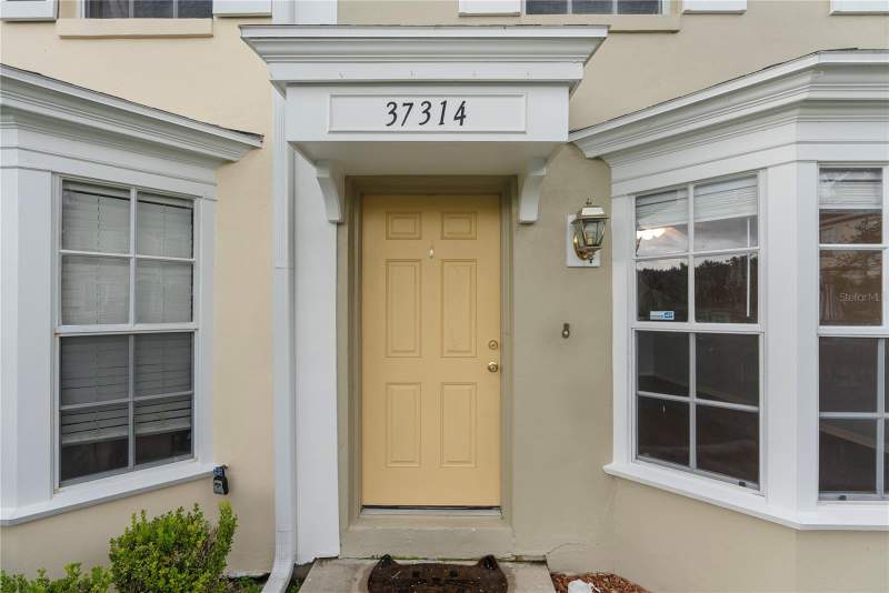 2 bedroom Townhouse at 37314 Embassy Park Ln, Embassy Park Twnhms Condo, Dade City — photo 2